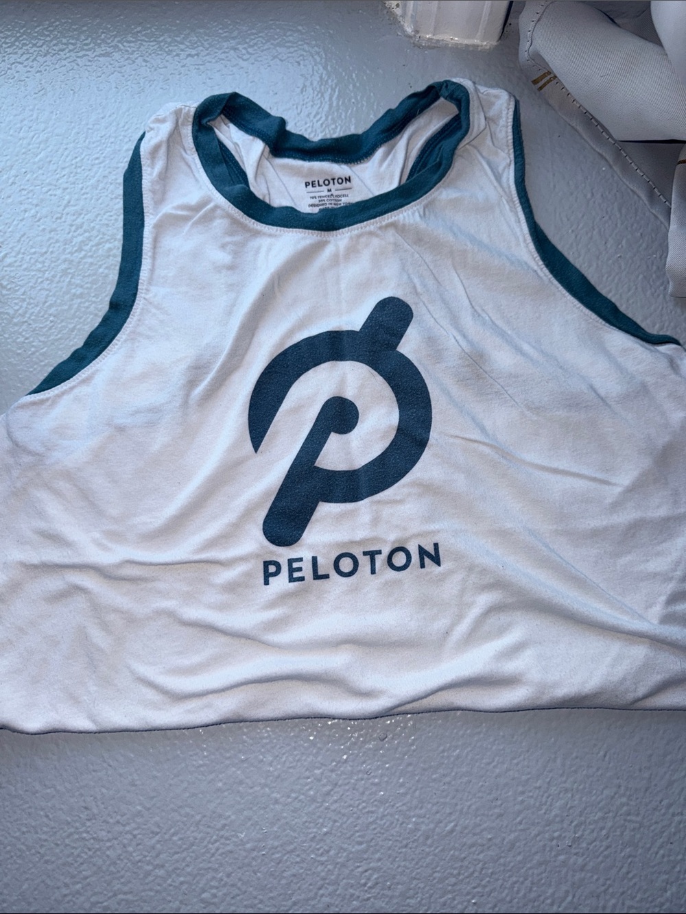 Peloton White Tank with Teal Trim and Logo